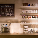 Full view of Shelby's lit bar and refreshments menu.